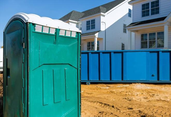 portable toilets on a busy job site, providing necessary facilities